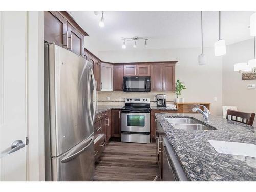 108-5110 36 Street, Red Deer, AB - Indoor Photo Showing Kitchen With Stainless Steel Kitchen With Double Sink