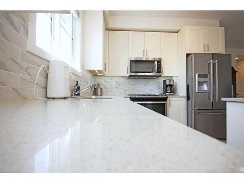 1415-298 Sage Meadows Park Nw, Calgary, AB - Indoor Photo Showing Kitchen With Upgraded Kitchen