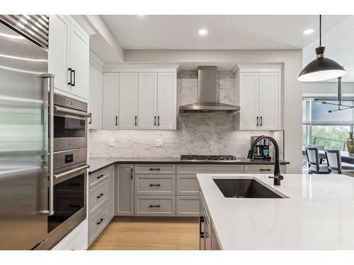 110-15 Cougar Ridge Landing Sw, Calgary, AB - Indoor Photo Showing Kitchen With Upgraded Kitchen