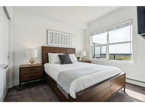 413-19621 40 Street Se, Calgary, AB - Indoor Photo Showing Bedroom