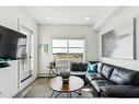 413-19621 40 Street Se, Calgary, AB  - Indoor Photo Showing Living Room 