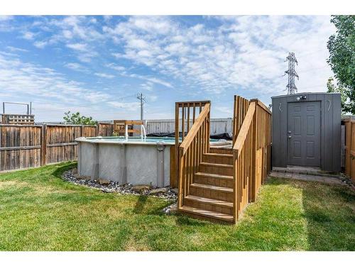 88 Evansford Circle Nw, Calgary, AB - Outdoor With Above Ground Pool