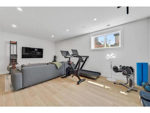 52 Seton Rise Se, Calgary, AB - Indoor Photo Showing Gym Room