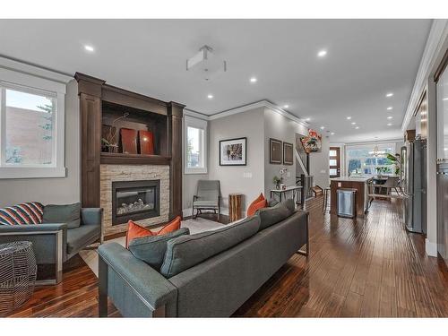 2642 25 Street Sw, Calgary, AB - Indoor Photo Showing Living Room With Fireplace