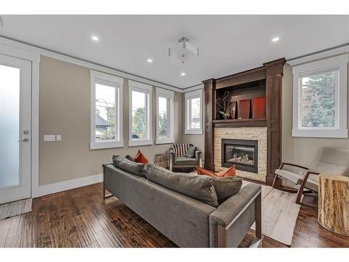 2642 25 Street Sw, Calgary, AB - Indoor Photo Showing Living Room With Fireplace