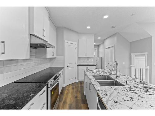 145 Howse Avenue Ne, Calgary, AB - Indoor Photo Showing Kitchen With Stainless Steel Kitchen With Double Sink With Upgraded Kitchen