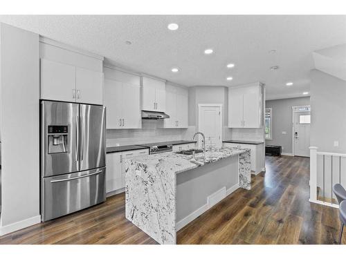 145 Howse Avenue Ne, Calgary, AB - Indoor Photo Showing Kitchen With Stainless Steel Kitchen With Upgraded Kitchen