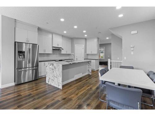 145 Howse Avenue Ne, Calgary, AB - Indoor Photo Showing Kitchen With Stainless Steel Kitchen With Upgraded Kitchen