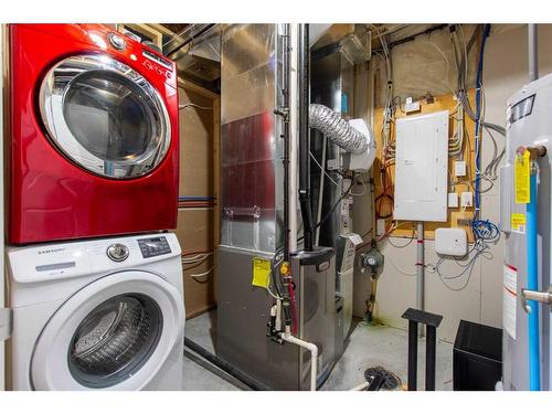 145 Howse Avenue Ne, Calgary, AB - Indoor Photo Showing Laundry Room