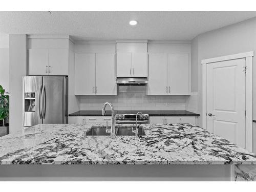 145 Howse Avenue Ne, Calgary, AB - Indoor Photo Showing Kitchen With Stainless Steel Kitchen With Upgraded Kitchen