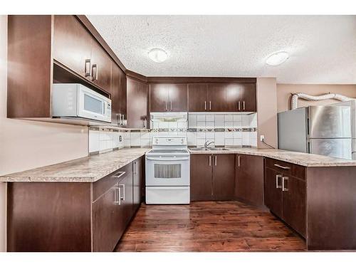 112 Falwood Crescent Ne, Calgary, AB - Indoor Photo Showing Kitchen