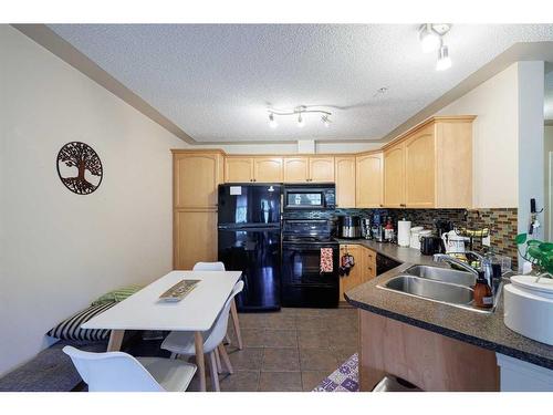 313-369 Rocky Vista Park Nw, Calgary, AB - Indoor Photo Showing Kitchen With Double Sink