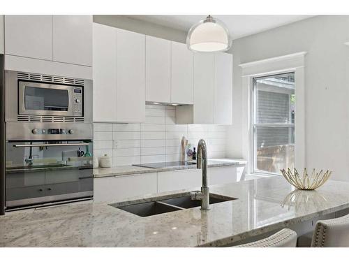 1623 13 Avenue Sw, Calgary, AB - Indoor Photo Showing Kitchen With Double Sink With Upgraded Kitchen