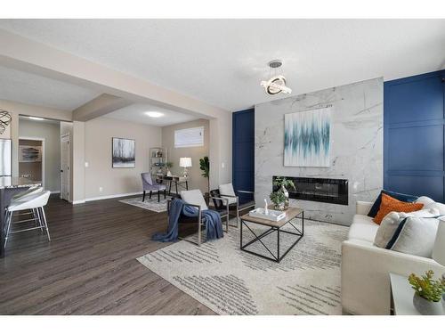 41 Sage Bluff Close Nw, Calgary, AB - Indoor Photo Showing Living Room With Fireplace