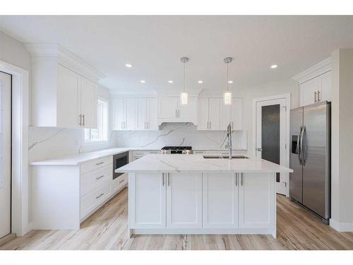 255 Panorama Hills Manor Nw, Calgary, AB - Indoor Photo Showing Kitchen With Upgraded Kitchen