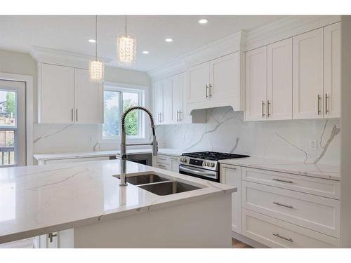 255 Panorama Hills Manor Nw, Calgary, AB - Indoor Photo Showing Kitchen With Double Sink With Upgraded Kitchen