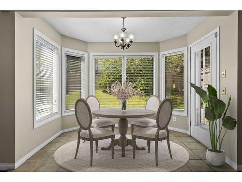 53 Shawnee Rise Sw, Calgary, AB - Indoor Photo Showing Dining Room