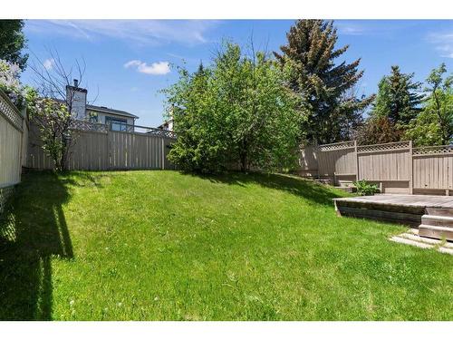 53 Shawnee Rise Sw, Calgary, AB - Outdoor With Backyard