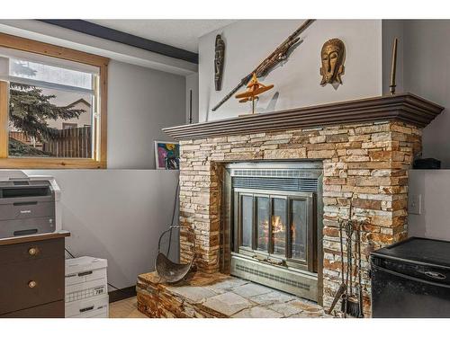 342 Hoodoo Crescent, Canmore, AB - Indoor With Fireplace