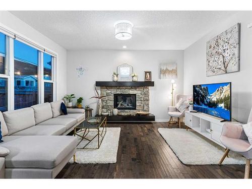 2087 Brightoncrest Common Se, Calgary, AB - Indoor Photo Showing Living Room With Fireplace