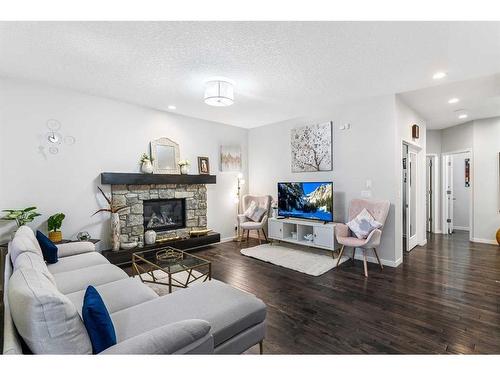 2087 Brightoncrest Common Se, Calgary, AB - Indoor Photo Showing Living Room With Fireplace