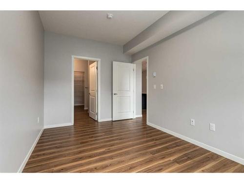 211-360 Harvest Hills Way Ne, Calgary, AB - Indoor Photo Showing Other Room