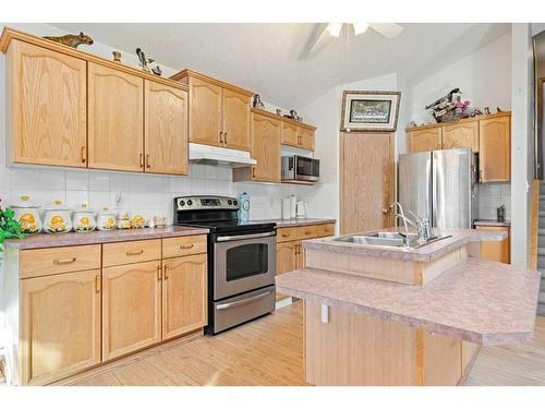 8 Bridleridge Road Sw, Calgary, AB - Indoor Photo Showing Kitchen With Double Sink