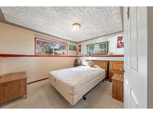 8 Bridleridge Road Sw, Calgary, AB - Indoor Photo Showing Bedroom