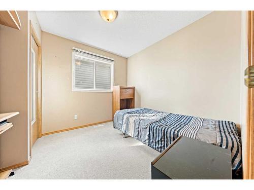 8 Bridleridge Road Sw, Calgary, AB - Indoor Photo Showing Bedroom