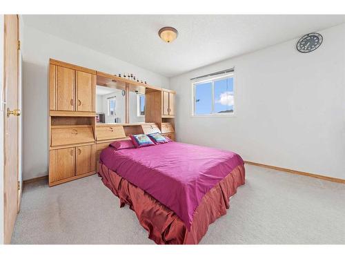 8 Bridleridge Road Sw, Calgary, AB - Indoor Photo Showing Bedroom