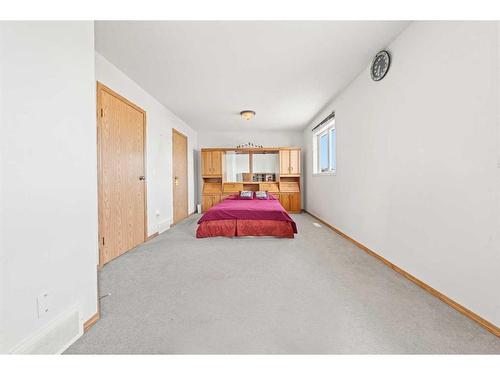 8 Bridleridge Road Sw, Calgary, AB - Indoor Photo Showing Bedroom