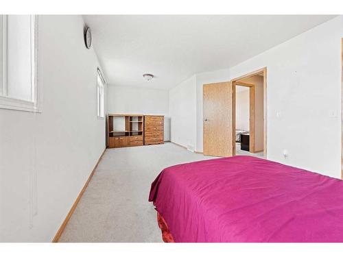 8 Bridleridge Road Sw, Calgary, AB - Indoor Photo Showing Bedroom