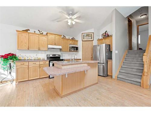 8 Bridleridge Road Sw, Calgary, AB - Indoor Photo Showing Kitchen With Double Sink