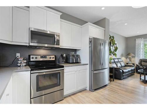 222 Vista Drive, Crossfield, AB - Indoor Photo Showing Kitchen With Stainless Steel Kitchen