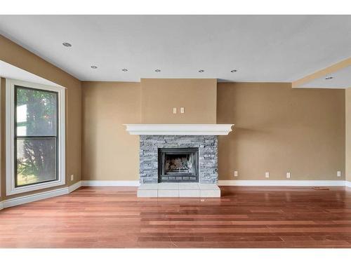 144 Macewan Glen Close Nw, Calgary, AB - Indoor With Fireplace