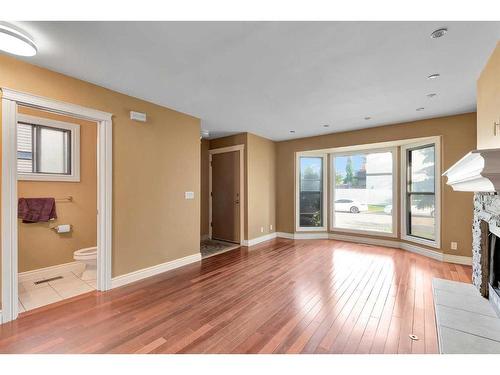 144 Macewan Glen Close Nw, Calgary, AB - Indoor With Fireplace