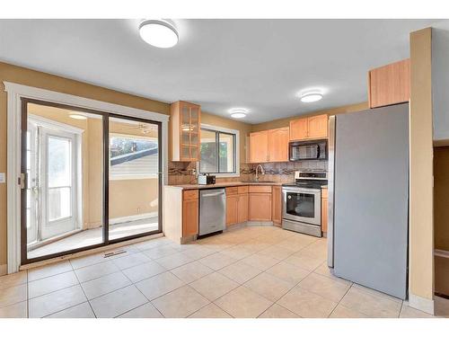 144 Macewan Glen Close Nw, Calgary, AB - Indoor Photo Showing Kitchen