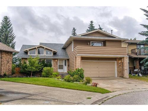 11 Edgehill Bay Nw, Calgary, AB - Outdoor With Balcony With Facade