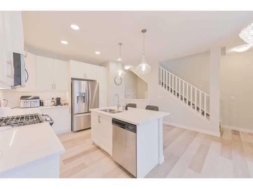 31 Crestbrook Drive Sw, Calgary, AB - Indoor Photo Showing Kitchen With Double Sink