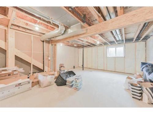 31 Crestbrook Drive Sw, Calgary, AB - Indoor Photo Showing Basement