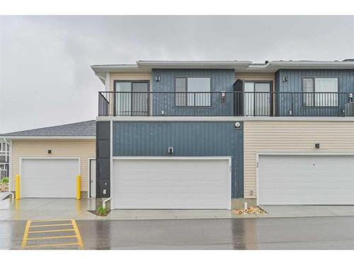 31 Crestbrook Drive Sw, Calgary, AB - Outdoor With Balcony