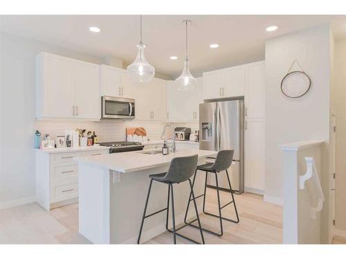 31 Crestbrook Drive Sw, Calgary, AB - Indoor Photo Showing Kitchen With Upgraded Kitchen