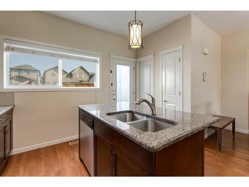 242 Cranford Way Se, Calgary, AB - Indoor Photo Showing Kitchen With Double Sink