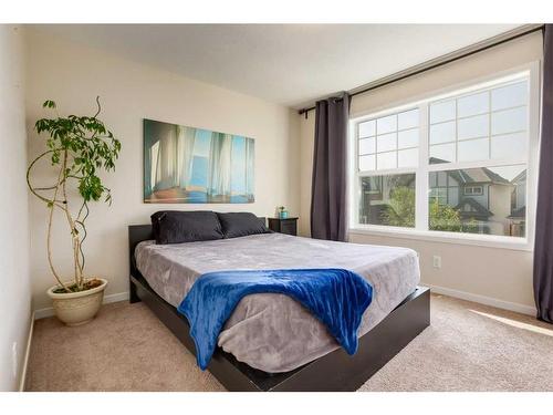 242 Cranford Way Se, Calgary, AB - Indoor Photo Showing Bedroom