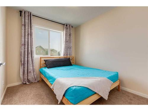 242 Cranford Way Se, Calgary, AB - Indoor Photo Showing Bedroom