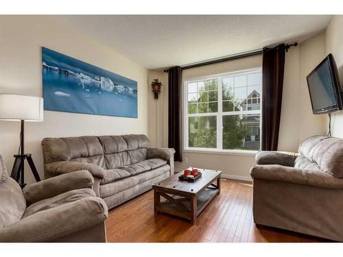 242 Cranford Way Se, Calgary, AB - Indoor Photo Showing Living Room