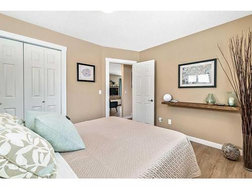 77 2 Street Se, High River, AB - Indoor Photo Showing Bedroom