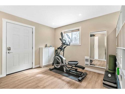 77 2 Street Se, High River, AB - Indoor Photo Showing Gym Room