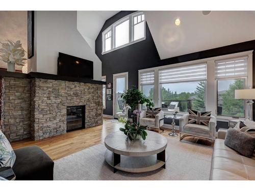 204 Leighton Court, Rural Rocky View County, AB - Indoor Photo Showing Living Room With Fireplace