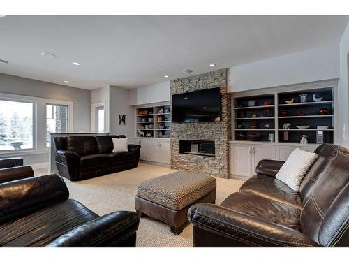 204 Leighton Court, Rural Rocky View County, AB - Indoor Photo Showing Living Room With Fireplace